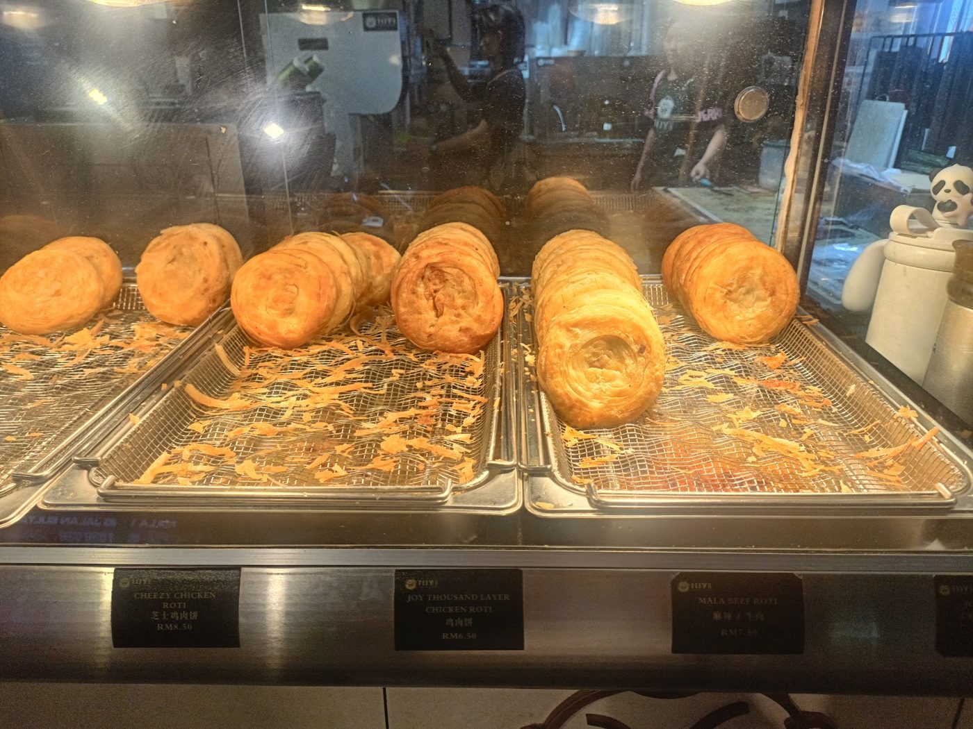 Golden roti patties in the display